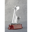 Metallic number '1' golf trophy award on a gray background